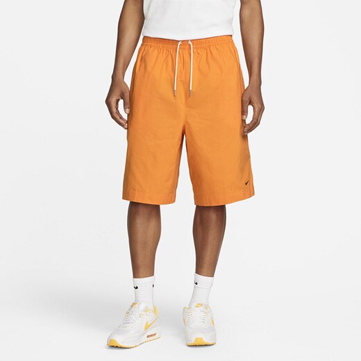 orange nike shorts woven